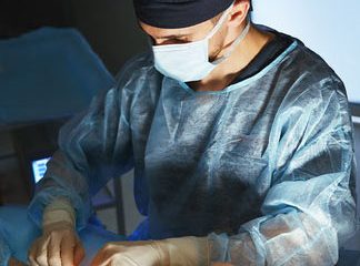 Physician performing laser ablation